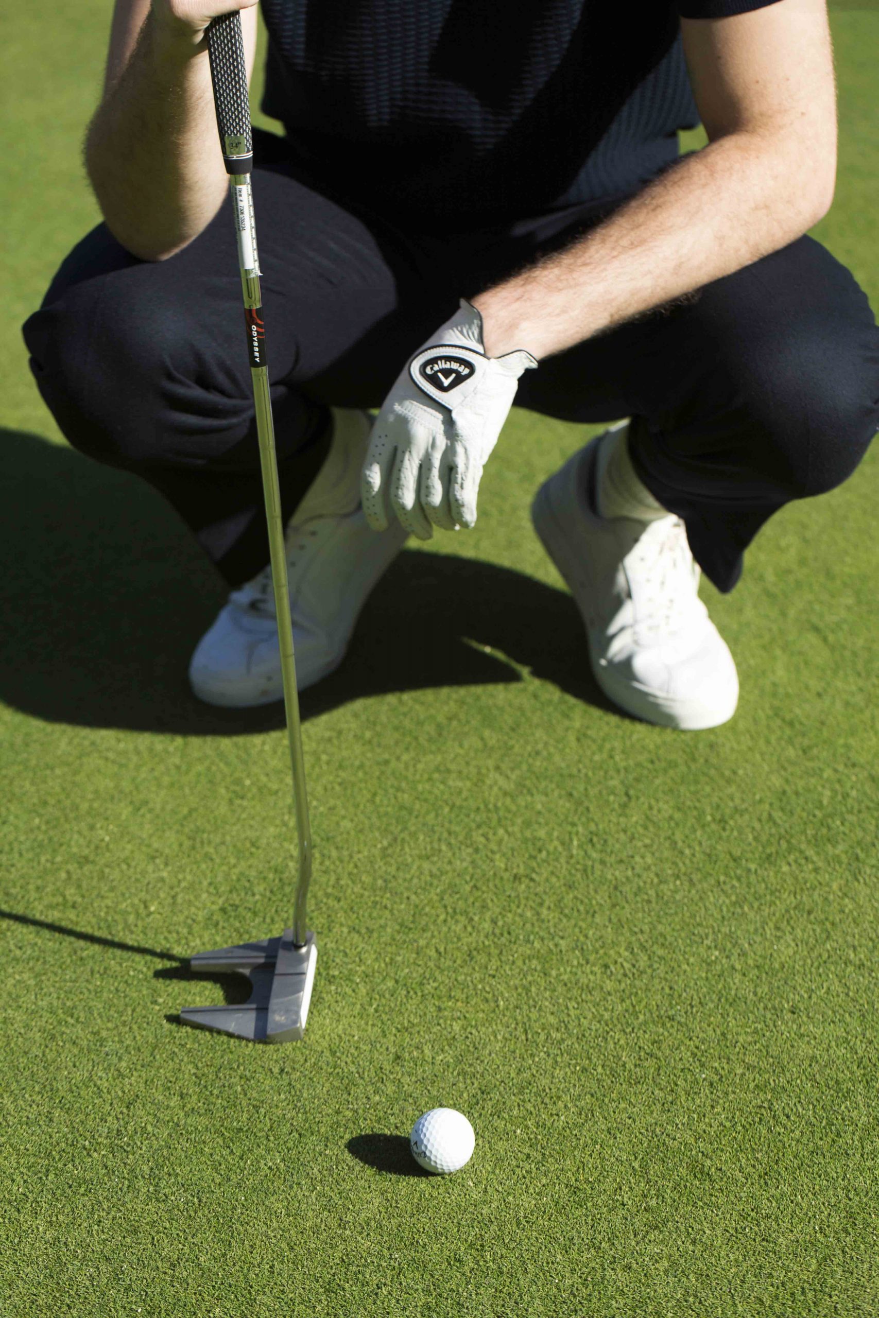 A lad holding a golf club at Mount Juliet Golf Course